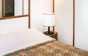 Posteľ alebo postele v izbe v ubytovaní Cozy Apartment In Vason