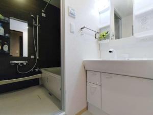 Ett badrum på 12池袋最中心 两室一厅两浴室两卫生间 池袋站7分 2 rooms Ikebukuro center 7 mins to ST Max 8P 直达新宿 涉谷 表参道 池袋 上野 代代木 银座 原宿