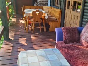 Posedenie v ubytovaní Ferienhaus Marianna am See mit gratis Sauna, Ruderboot, Kajak & WLAN