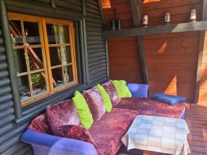 Posedenie v ubytovaní Ferienhaus Marianna am See mit gratis Sauna, Ruderboot, Kajak & WLAN