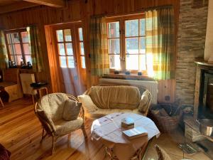 Posedenie v ubytovaní Ferienhaus Marianna am See mit gratis Sauna, Ruderboot, Kajak & WLAN