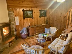 Posedenie v ubytovaní Ferienhaus Marianna am See mit gratis Sauna, Ruderboot, Kajak & WLAN