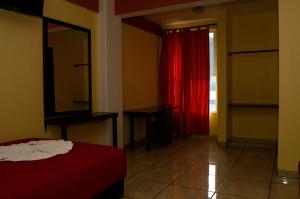 Postel nebo postele na pokoji v ubytování Hotel Casa Rus