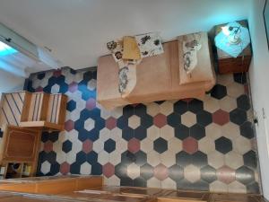 a kitchen with a bunch of boxes on the wall at Centro Storico Portoferraio in Portoferraio