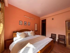 Postel nebo postele na pokoji v ubytování Hotel Geetanjali
