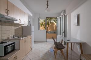 Η κουζίνα ή μικρή κουζίνα στο Happy Apartments +31 φωτογραφίες