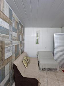 a room with two beds in a room at FLAT CENTRAL- Ar-Condicionado-Estacionamento in Feira de Santana