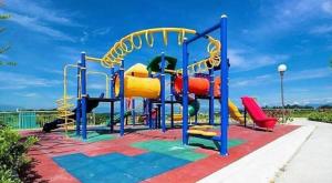 a playground with a slide on a colorful at CASABONITA fte alberca, AirAc in Alpuyeca