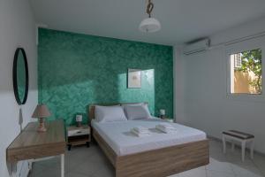 Ένα ή περισσότερα κρεβάτια σε δωμάτιο στο Happy Apartments