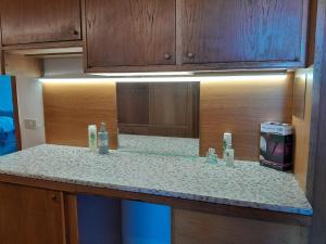 a kitchen counter with a sink in a room at Centro Storico Portoferraio in Portoferraio +29 photos