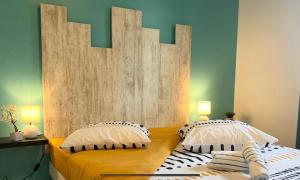 Tempat tidur dalam kamar di Effet Mer
