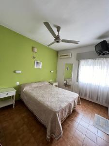 Ένα ή περισσότερα κρεβάτια σε δωμάτιο στο Hotel Grisabel