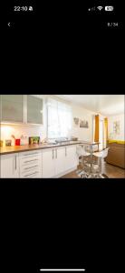 Køkken eller tekøkken på Proche Disney et Paris - Studio terrasse et parking privé