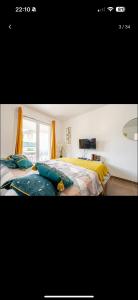 En eller flere senge i et værelse på Proche Disney et Paris - Studio terrasse et parking privé