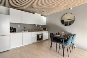Kjøkken eller kjøkkenkrok på ARCTIC HOMES - Premium Aurora Apartment