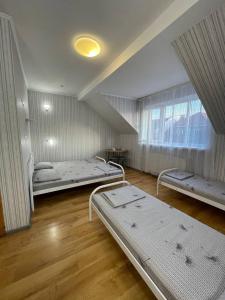Postel nebo postele na pokoji v ubytování VIP hostel + 37 fotografií