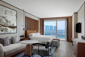 Televiisor ja/või meelelahutuskeskus majutusasutuses Sheraton Zhaoqing Dinghu
