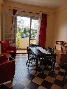 Χώρος καθιστικού στο Appartement sympathique Jules Ferry.