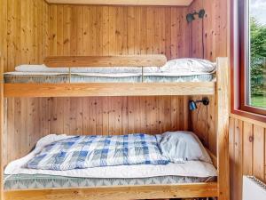 Postel nebo postele na pokoji v ubytování Family Fun in Arrild - By Traum Ferienwohnungen