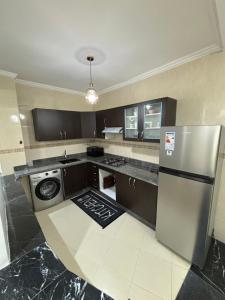 Kuchyň nebo kuchyňský kout v ubytování Appartement La Tulip