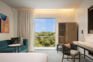 Katil atau katil-katil dalam bilik di Courtyard by Marriott Curacao
