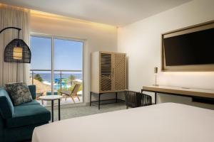 Katil atau katil-katil dalam bilik di Courtyard by Marriott Curacao