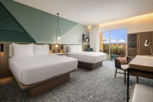 Katil atau katil-katil dalam bilik di Courtyard by Marriott Curacao