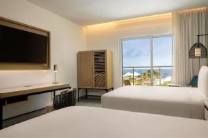 Katil atau katil-katil dalam bilik di Courtyard by Marriott Curacao