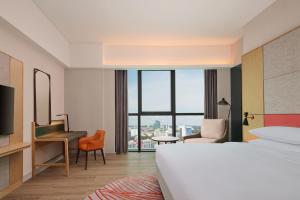 TV a/nebo společenská místnost v ubytování Sheraton Kuching Hotel