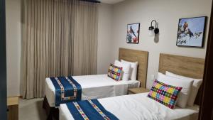 Ένα ή περισσότερα κρεβάτια σε δωμάτιο στο QUINTA SANTA BÁRBARA ECO RESORT +11 φωτογραφίες