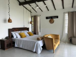 Postel nebo postele na pokoji v ubytování La Villa The View