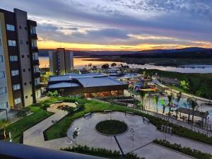 an aerial view of a building with a park at Praias do Lago Eco Resort - Central de Reservas in Caldas Novas