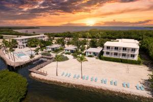 an aerial view of a resort with a pool at Fisher Inn Resort & Marina in Islamorada