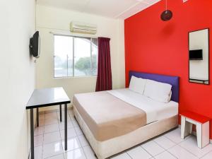 Postel nebo postele na pokoji v ubytování Hotel Rim Global, Klang