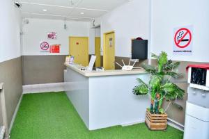 TV a/nebo společenská místnost v ubytování Hotel Rim Global, Klang