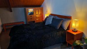 Ein Bett oder Betten in einem Zimmer der Unterkunft Piedra Negra Boutique Hotel