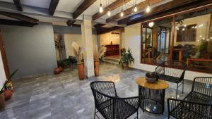 Ein Sitzbereich in der Unterkunft Piedra Negra Boutique Hotel