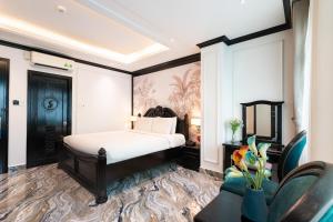 Giường trong phòng chung tại Nicecy Saigon Hotel +37 ảnh