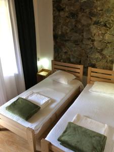 Postel nebo postele na pokoji v ubytování Guest House Nike