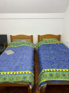 Giường trong phòng chung tại Vila Vera