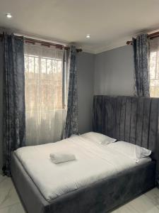 Giường trong phòng chung tại La vue suites