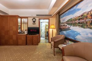 TV a/nebo společenská místnost v ubytování A25 Luxury Hotel