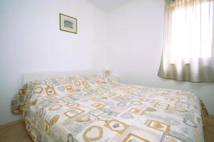 Posteľ alebo postele v izbe v ubytovaní Holiday house Nena with pool