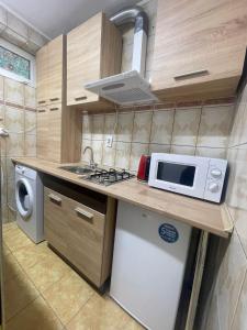 Kuchyň nebo kuchyňský kout v ubytování Zlata Tiny Home + 10 fotografií