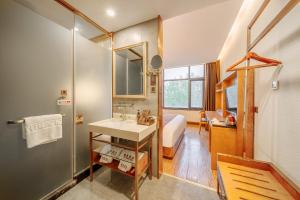 Kuchyň nebo kuchyňský kout v ubytování Cosy Feeling Hotel - Beijing Headquarters Xinfadi