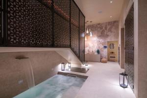 Ένα μπάνιο στο Dimora San Giuseppe Hotel & SPA