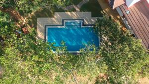 Bazén v ubytování Aqua Dunhinda Villa nebo v jeho okolí