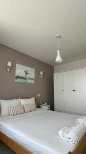 Postel nebo postele na pokoji v ubytování Queen Bed- Rooms GEA