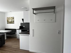 an open door to a kitchen with a desk at Fewo Klein Venedig in Bamberg
