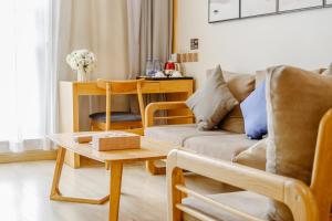 Posezení v ubytování Cosy Feeling Hotel - Beijing Headquarters Xinfadi